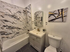 Hair dryer, towels, soap, toilet paper - Stylish 2BR in a Bed-Stuy Brownstone - with Private Patio (BROOKLYN)