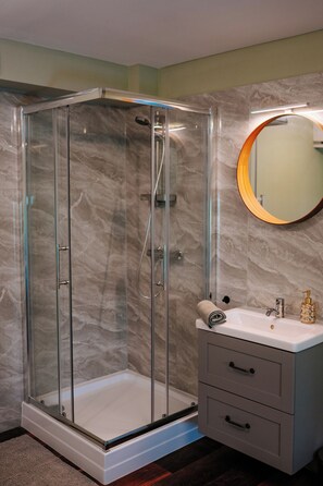 Shower, hair dryer, towels, soap