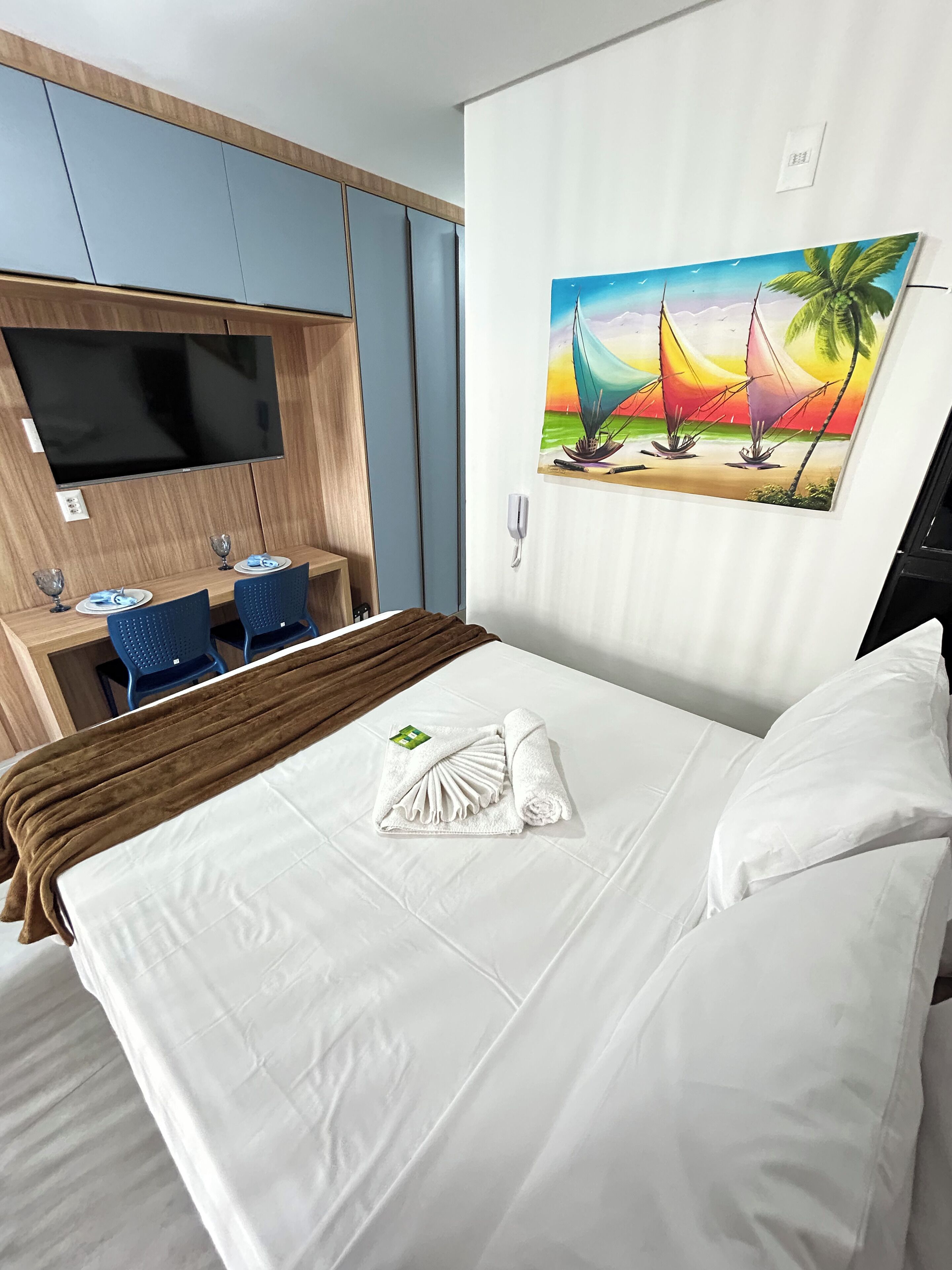 Apartamento | Espaço de trabalho para notebook, ferros/tábuas de passar roupa