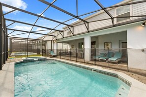 Outdoor pool, a heated pool - Cozy 8BD Stay - Pool, Games & Minutes to Disney (Davenport)