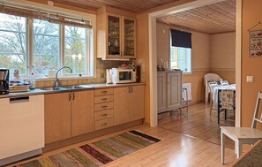 Fridge, stovetop, dishwasher, coffee/tea maker