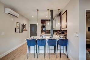 Microwave, oven, stovetop, dishwasher - Utica - Chic Tennyson 2-Bedroom Apt (Denver)