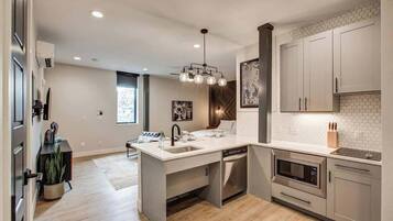 Microwave, stovetop, dishwasher, coffee/tea maker