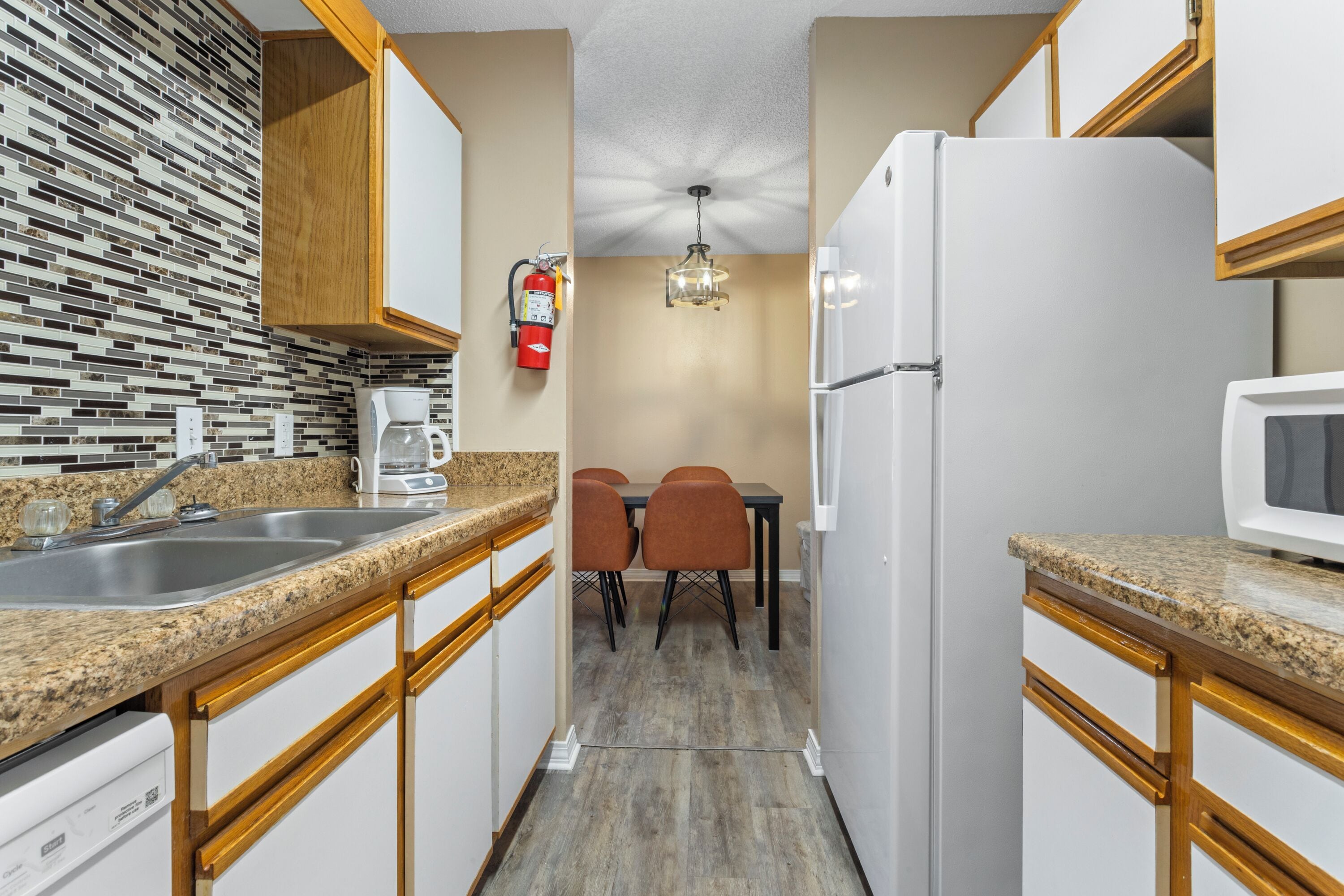 Apartment, City View | Private kitchen | Full-size fridge, microwave, oven, stovetop