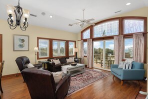 TV, fireplace, books - 7155 - Waves N Rays - Dog-Friendly Waves Getaway w/ Pool & Hot Tub (Waves)
