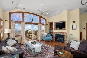 TV, fireplace, books - 7155 - Waves N Rays, a spacious 4-bedroom retreat in Waves, NC. (Waves)