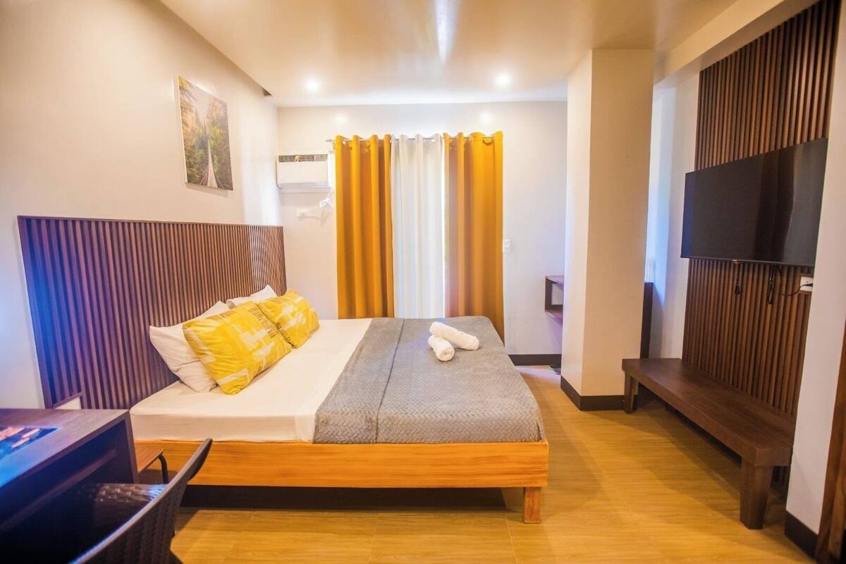 Habitación Deluxe, 1 cama King size, balcón, vista al jardín | Escritorio, espacio para trabajar con laptop y wifi gratis