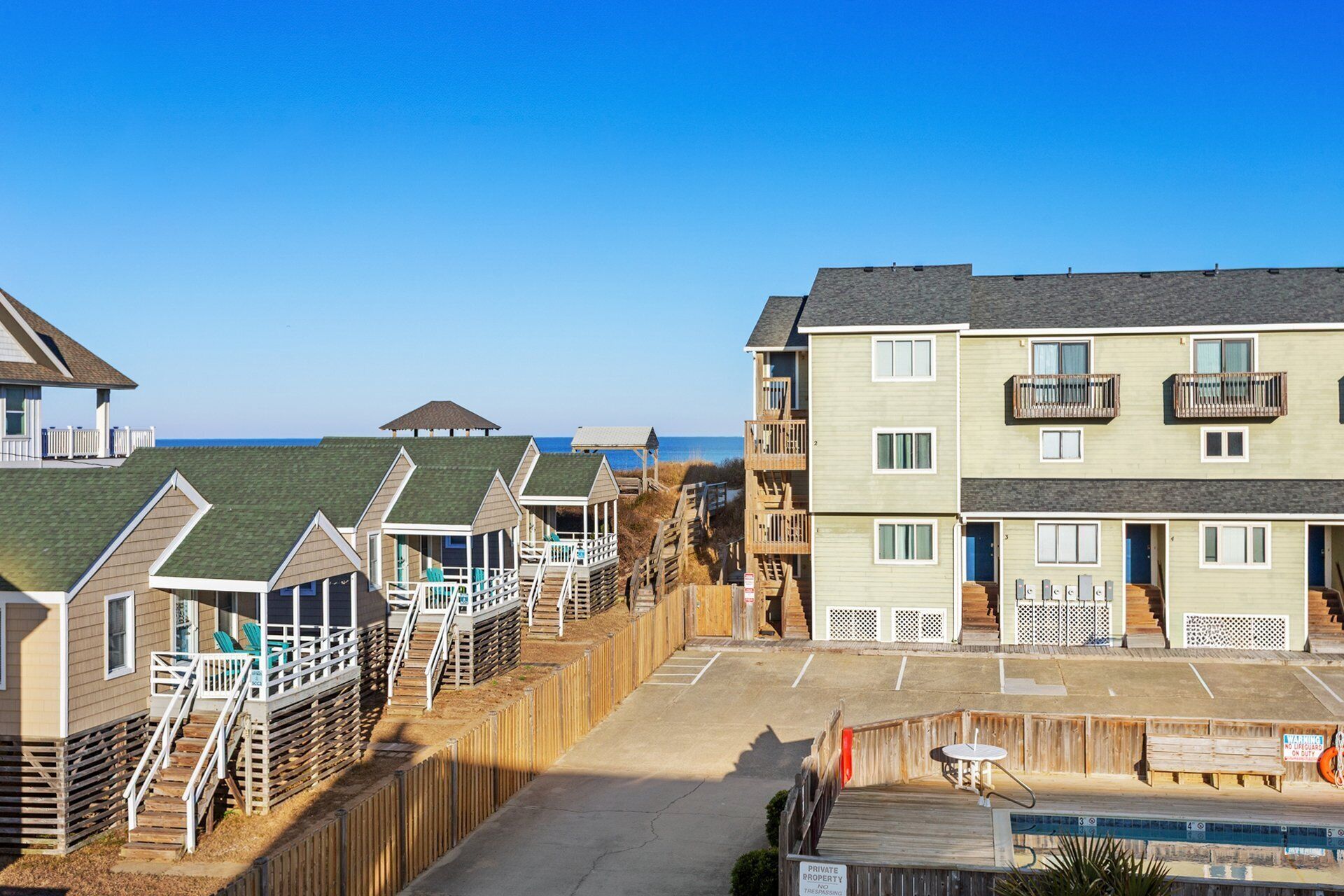 Top-Level Rear Deck: Private rear deck on the top level—perfect for relaxing with ocean breezes.