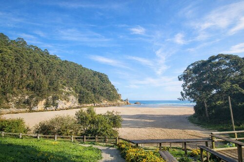 House Between Sea and Peaks in Colombres