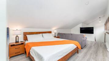 Tabla de planchar con plancha, cuna de viaje, wifi y ropa de cama