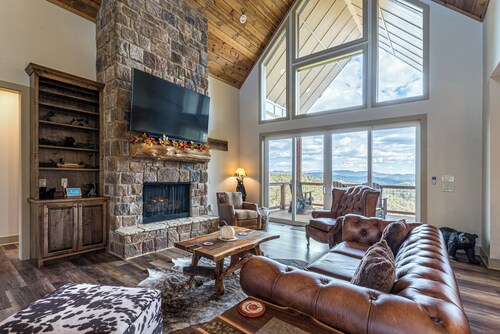 Endless views, hot tub, game room and theater!