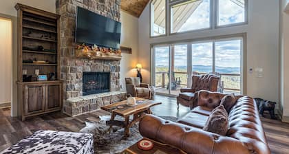 Endless views, hot tub, game room and theater!