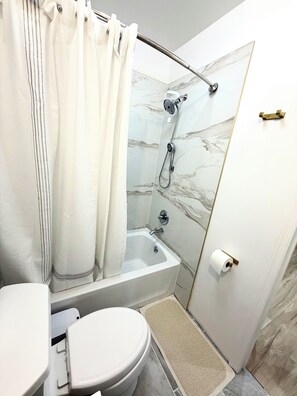 Hair dryer, towels, soap, toilet paper