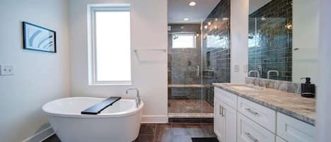 Shower, hair dryer, towels, shampoo