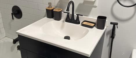 Hair dryer, bidet, towels, soap
