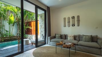 Villa | Living room | 65-inch Smart TV with digital channels