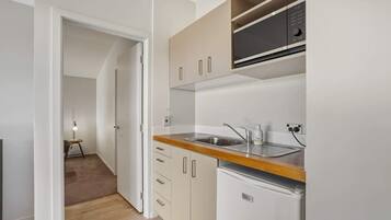 Microwave, electric kettle, toaster, cookware/dishes/utensils