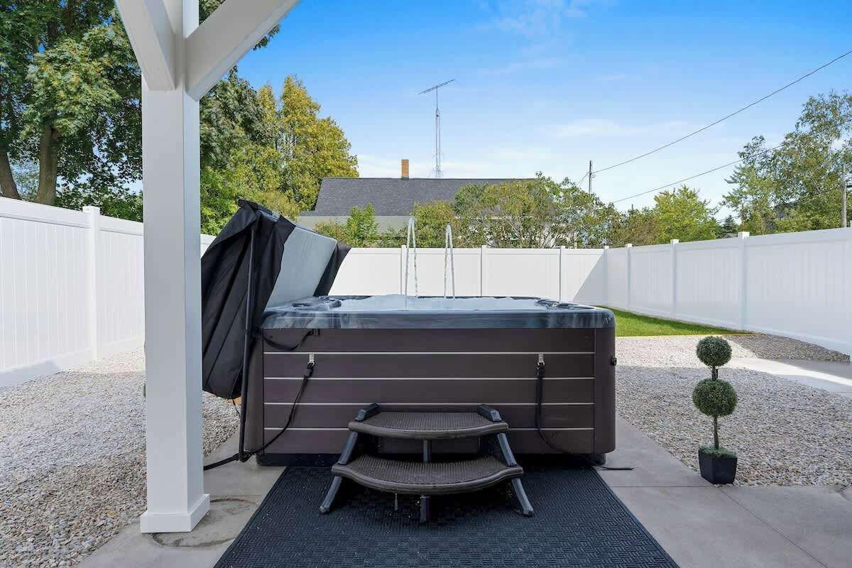 An amazing hot tub is available to both the upper unit and the lower unit of the duplex. It is fully fenced in for privacy. 