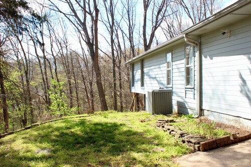 Tranquil bike-in, bike-out chalet in charming Bella Vista