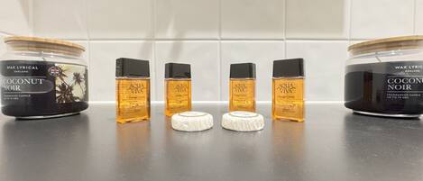 Hair dryer, towels, soap, toilet paper