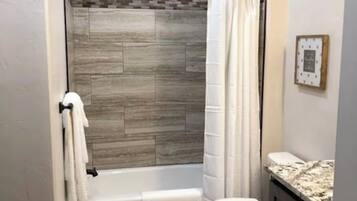 Hair dryer, towels, soap, toilet paper