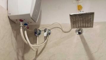 Standard Room | Bathroom | Free toiletries, towels, soap, shampoo