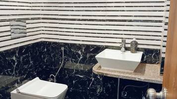 Standard Room | Bathroom | Free toiletries, towels, soap, shampoo