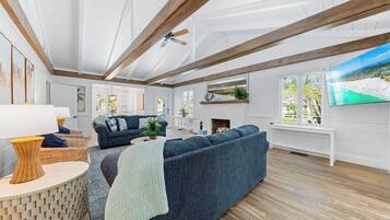 House (A Charming Beach Cottage) | Living room | TV