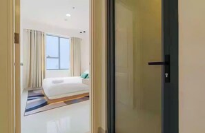 Basic Room, City View | In-room safe, desk, laptop workspace, blackout curtains - Pavilion Signature Park Legend Residence (Tan Son Hoa)