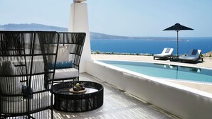 A balcony with a pool, lounge chairs, and a view of the sea. - Villa Meliora, Divine Sunset & Sea Views, Private Pool, Furnished Terrace, Oia (Santorini)
