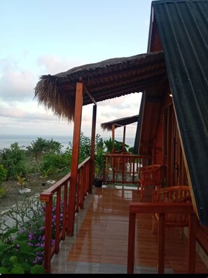 Quarto standard, vista para o mar | Terraço/pátio