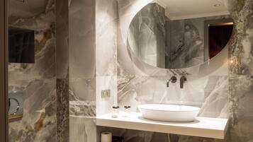 Studio Suite, Balcony, City View | Bathroom | Shower, hair dryer, slippers, towels