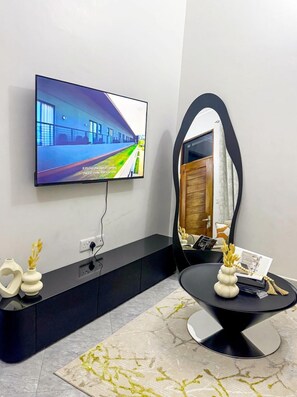 Apartamento luxo, vista para a cidade | Área de estar