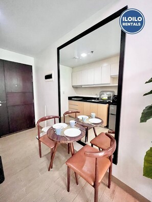 Shared Dormitory, 1 Bedroom, Accessible, Smoking | Dining room - Room-relax Stay at One Madison Tower (Iloilo)