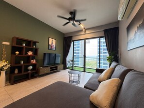 Living area - Perfect 2-bedroom apartment with AC in peaceful Melaka (melaka)