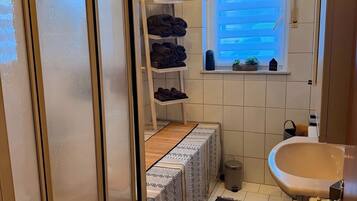 Shower, free toiletries, hair dryer, towels