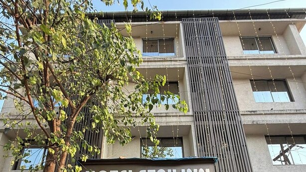 A hotel entrance with a sign reading "HOTEL STAY INN". - Hotel Stay Inn Rabale (Navi Mumbai)