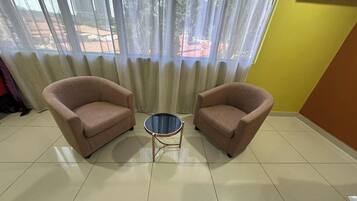 Family Room | Minibar, in-room safe, desk, blackout curtains