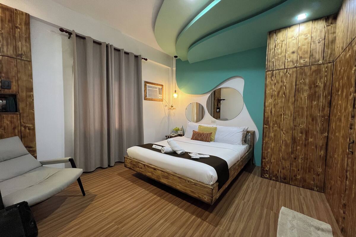 Habitación Deluxe | Escritorio, wifi gratis y ropa de cama