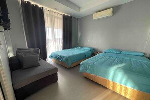 Family Loft, Pool View | Desk, rollaway beds, free WiFi, bed sheets - Villa Teresa Esperanza Tourist Inn (San Juan)