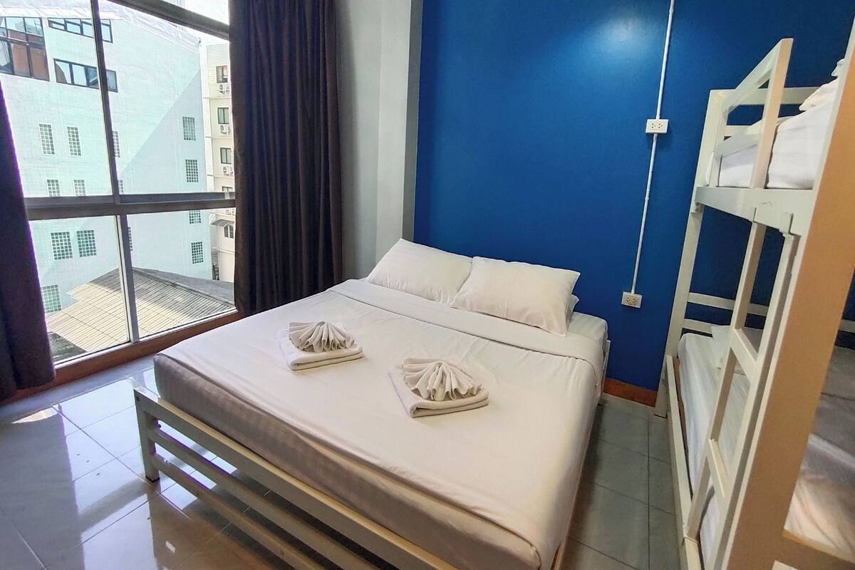 Family Room, Shared Bathroom | Desk, free WiFi, bed sheets