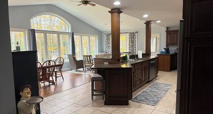 Large home with hot tub in serene wooded setting