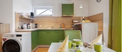 Fridge, microwave, stovetop, coffee/tea maker