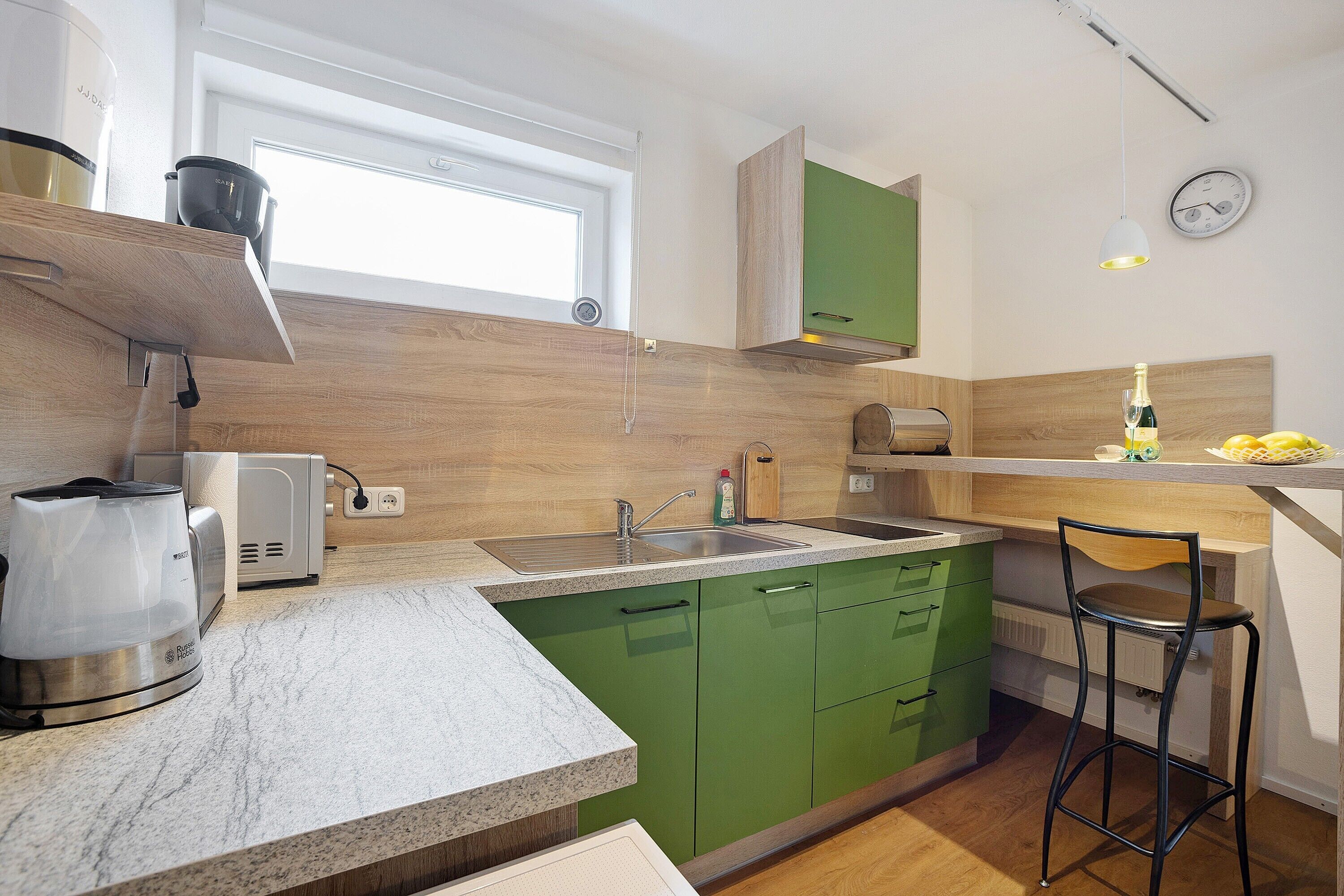 Fridge, microwave, stovetop, coffee/tea maker