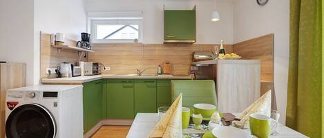 Fridge, microwave, stovetop, coffee/tea maker