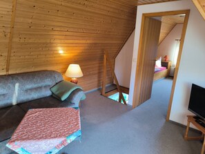 Living area - Swan Lake vacation home: Detached vacation home with lake view, garden and beach. (Mönchgut)