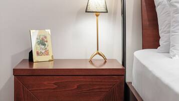 Desk, laptop workspace, blackout drapes, iron/ironing board