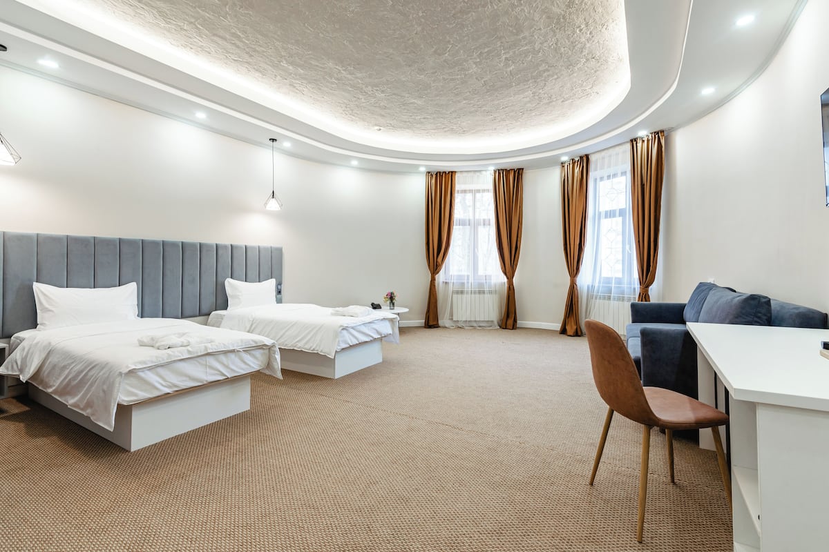 Luxury Twin Room, City View | In-room safe, desk, laptop workspace, soundproofing