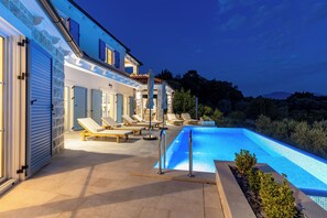 Outdoor pool, a heated pool - Spacious 4-bedroom villa with private heated pool, spa zone, and gym. (Đenovići)