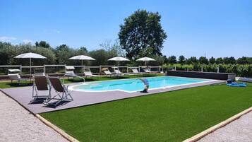Deluxe-Apartment, Balkon, Gartenblick | Pool